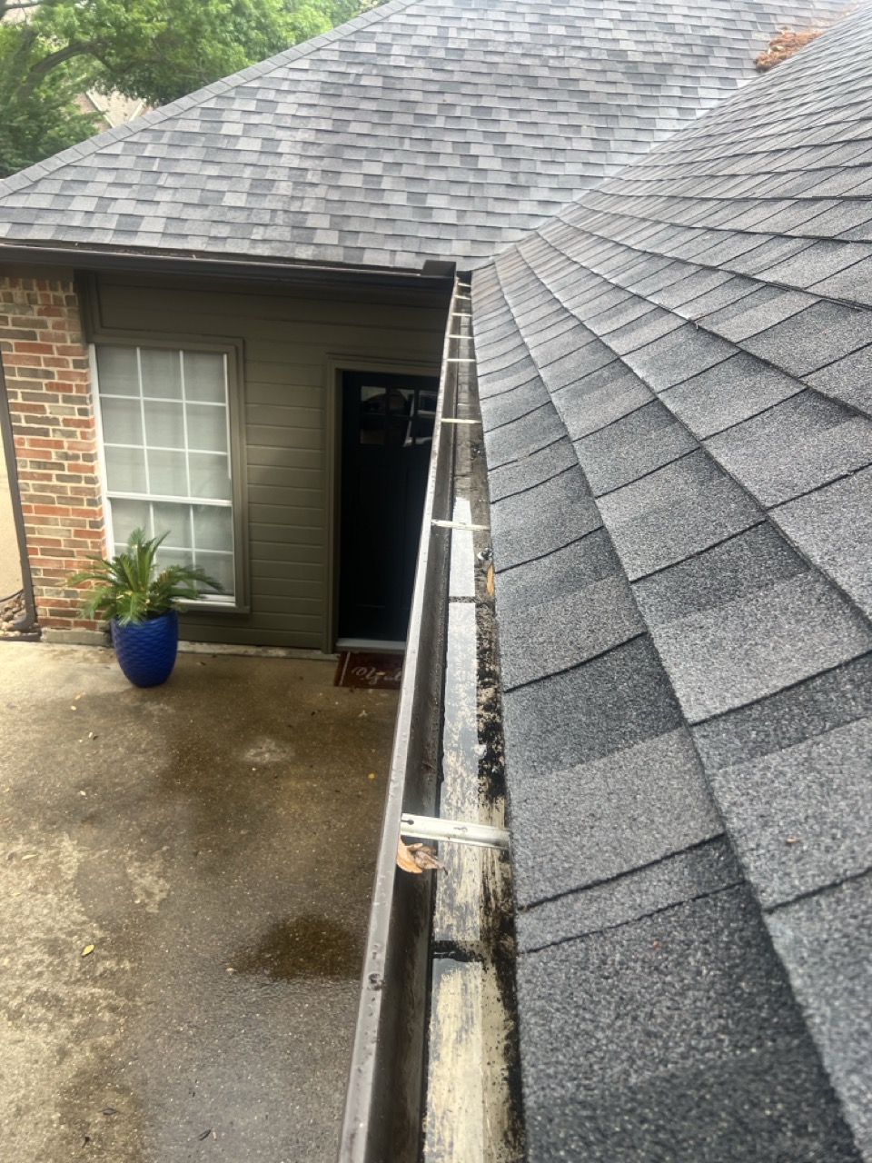 Cleared, flowing gutter after Hydro Power Washing gutter cleaning service