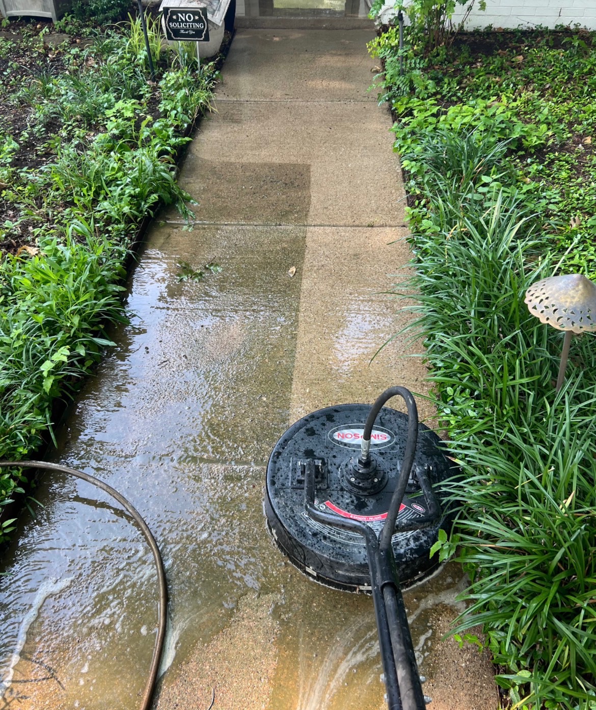 Sidewalk cleaning before and after with a surface cleaner
